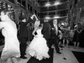 groom twirling bride